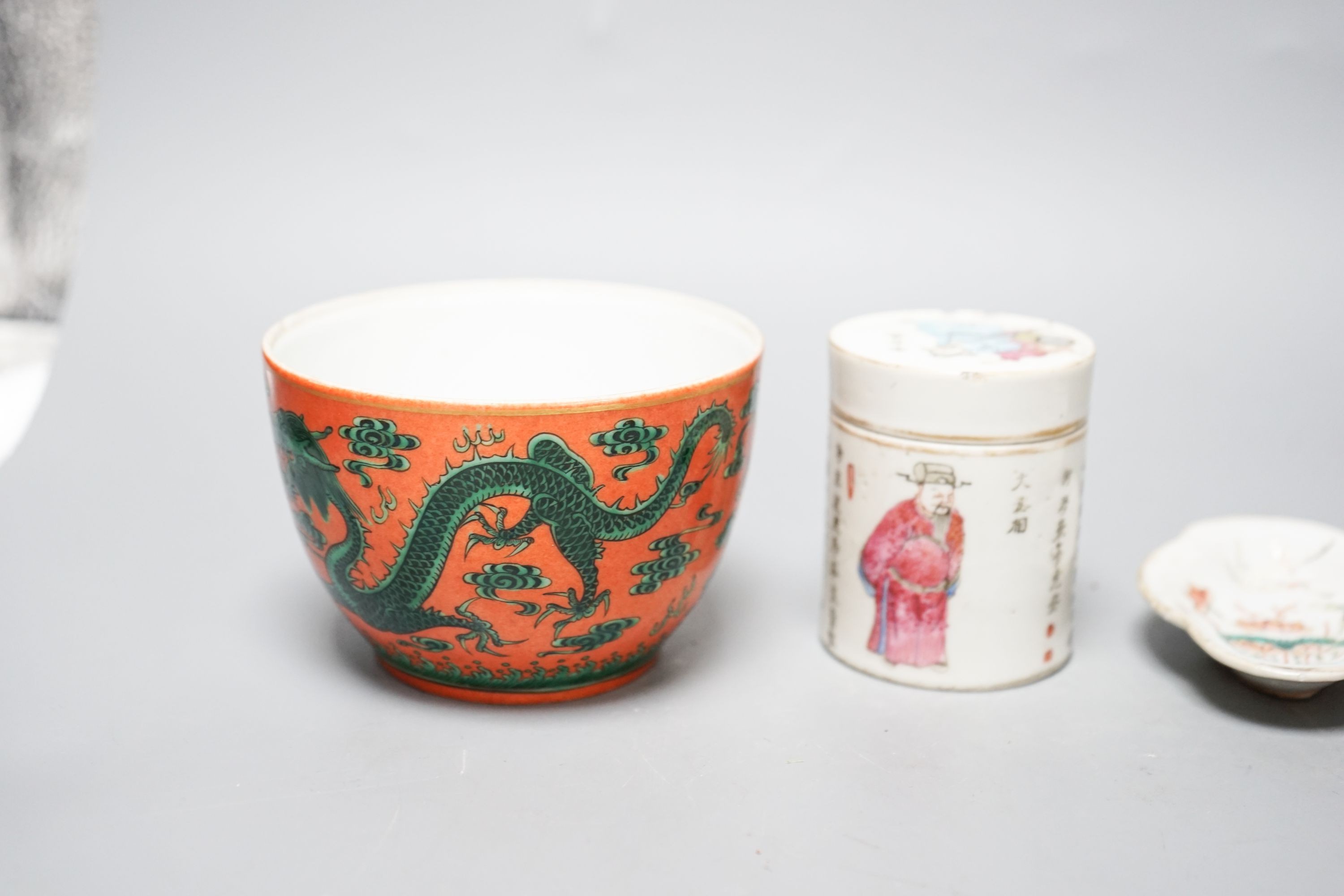 A Chinese orange ground dragon bowl, 11cm a famille rose box and cover and a similar pair of dishes, 19th century and later